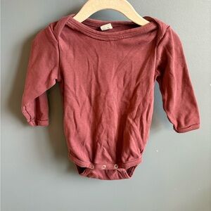 Kate Quinn Long Sleeve Lap Neck Body Suit